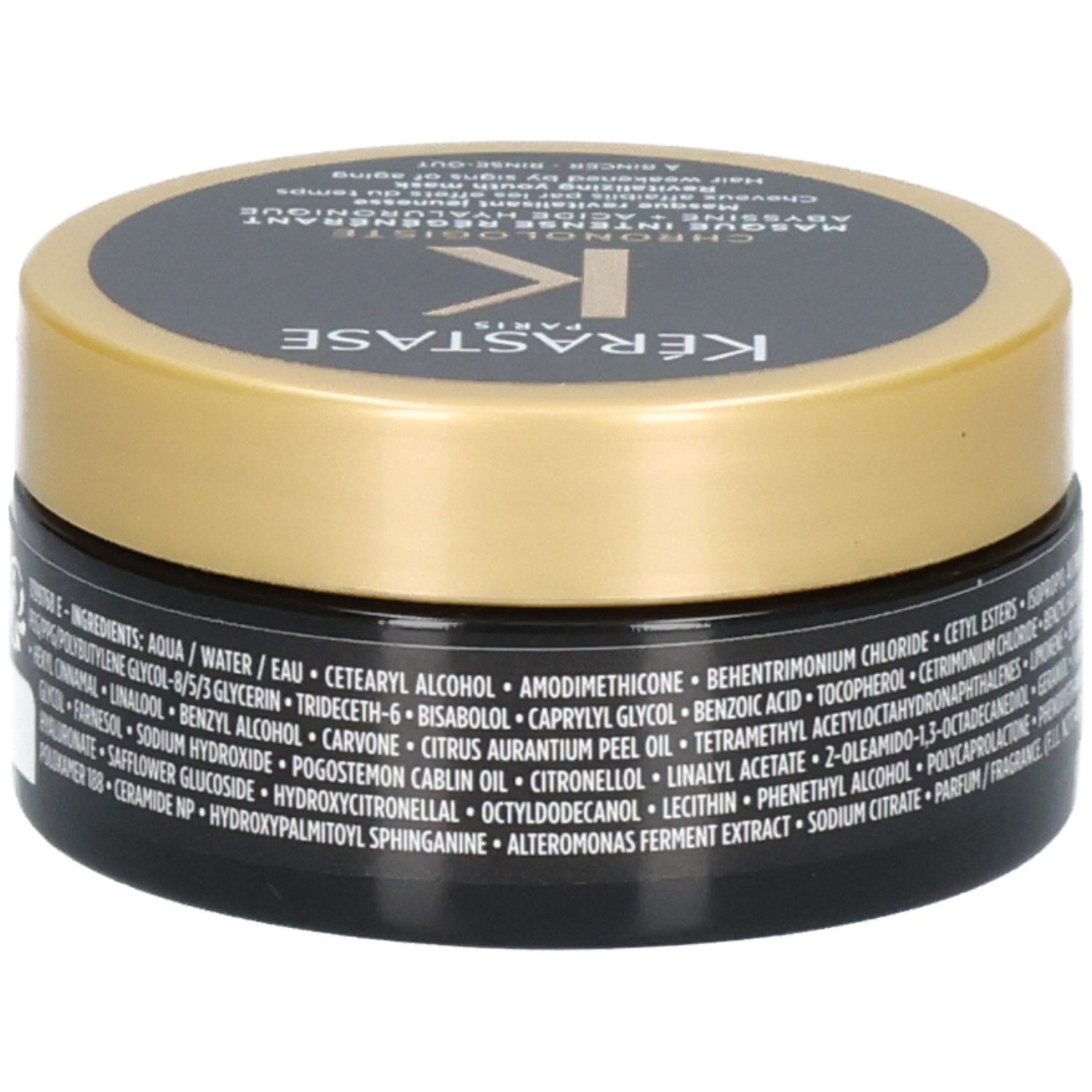 Kérastase Chronologiste masker, zwarte pot met goudkleurig deksel, etiket met ingrediënten en gebruiksinstructies.