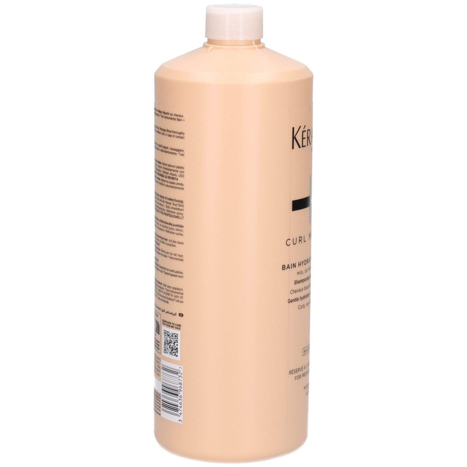 Kérastase Curl Manifesto Shampoo, 1 liter fles, achterkant met tekst.
