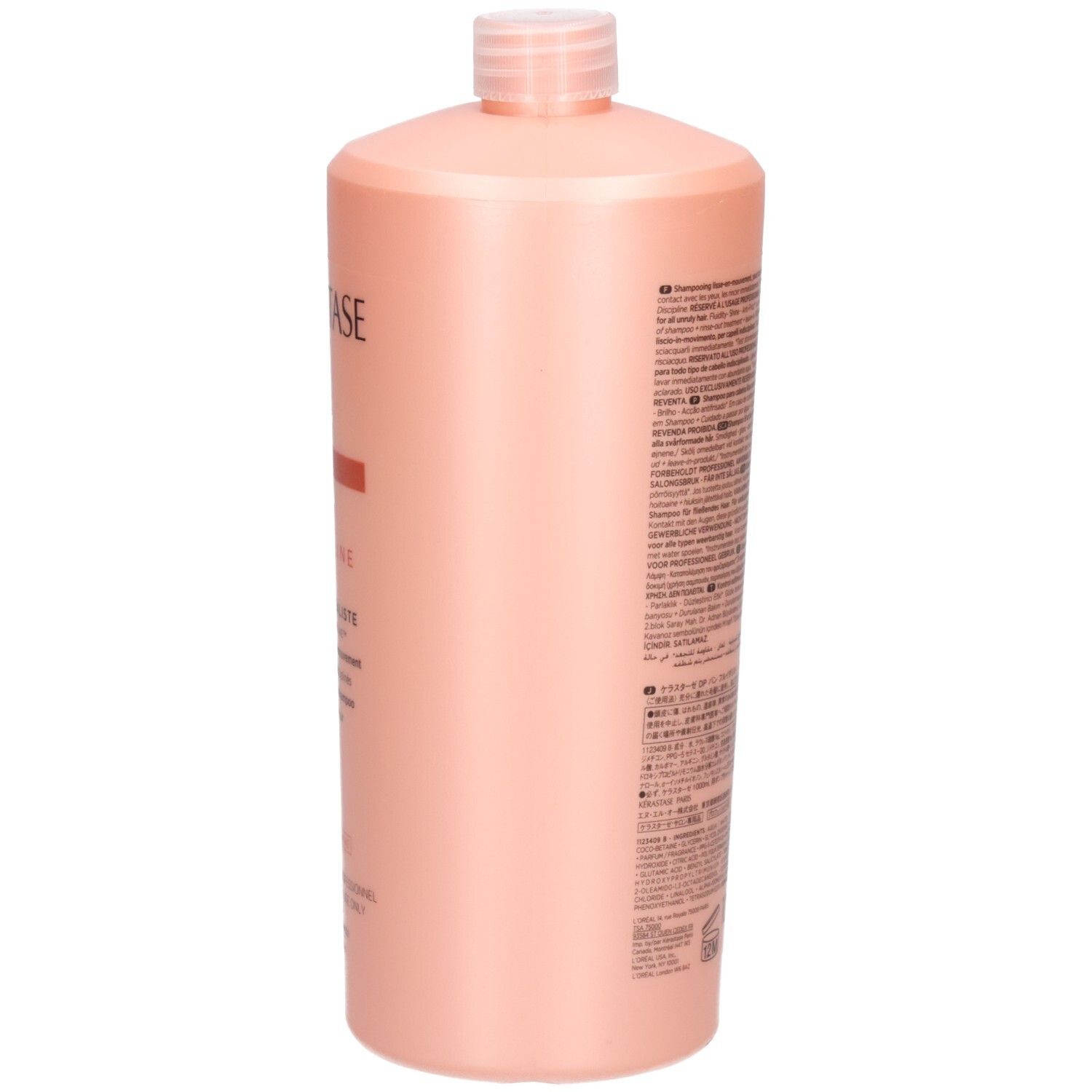 Côté du flacon de shampooing Kérastase Discipline Bain Fluidealiste avec texte.