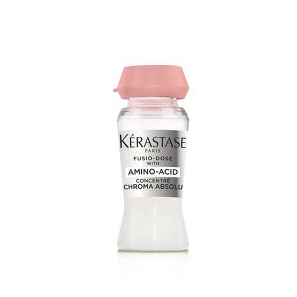 Kérastase Fusio-Dose Aminozuur Concentraat voor Chroma Absolu. Klein glazen flesje met roze dop.
