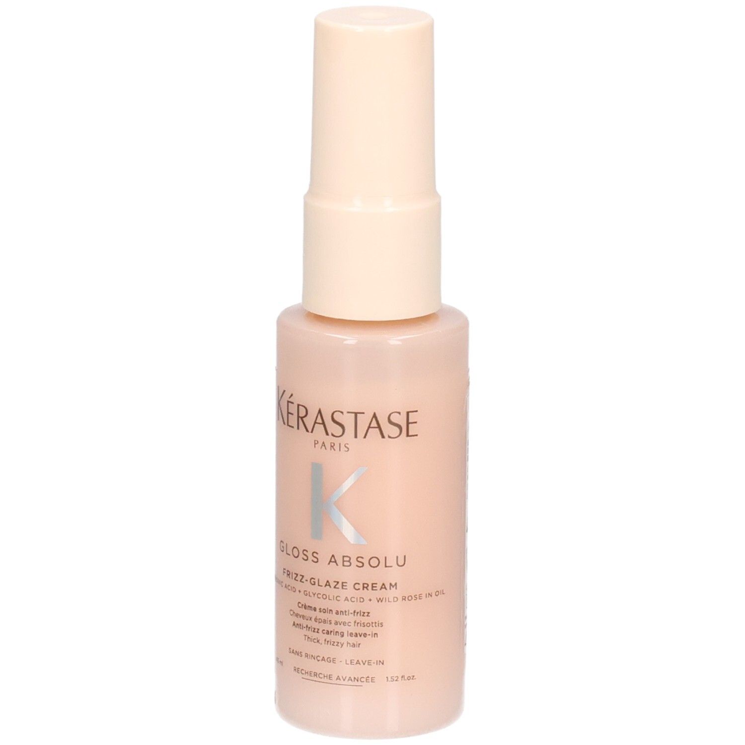 Kérastase Gloss Absolu Frizz-Glaze Cream Mini in een perzikkleurige pompfles, vooraanzicht.