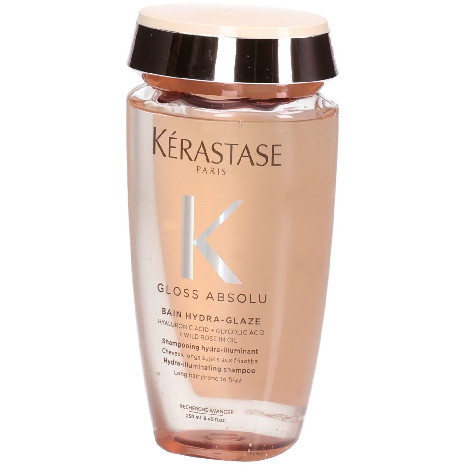 Shampoing Kérastase Gloss Absolu Hydra-Glaze. Vue de face du flacon transparent au contenu rosé.