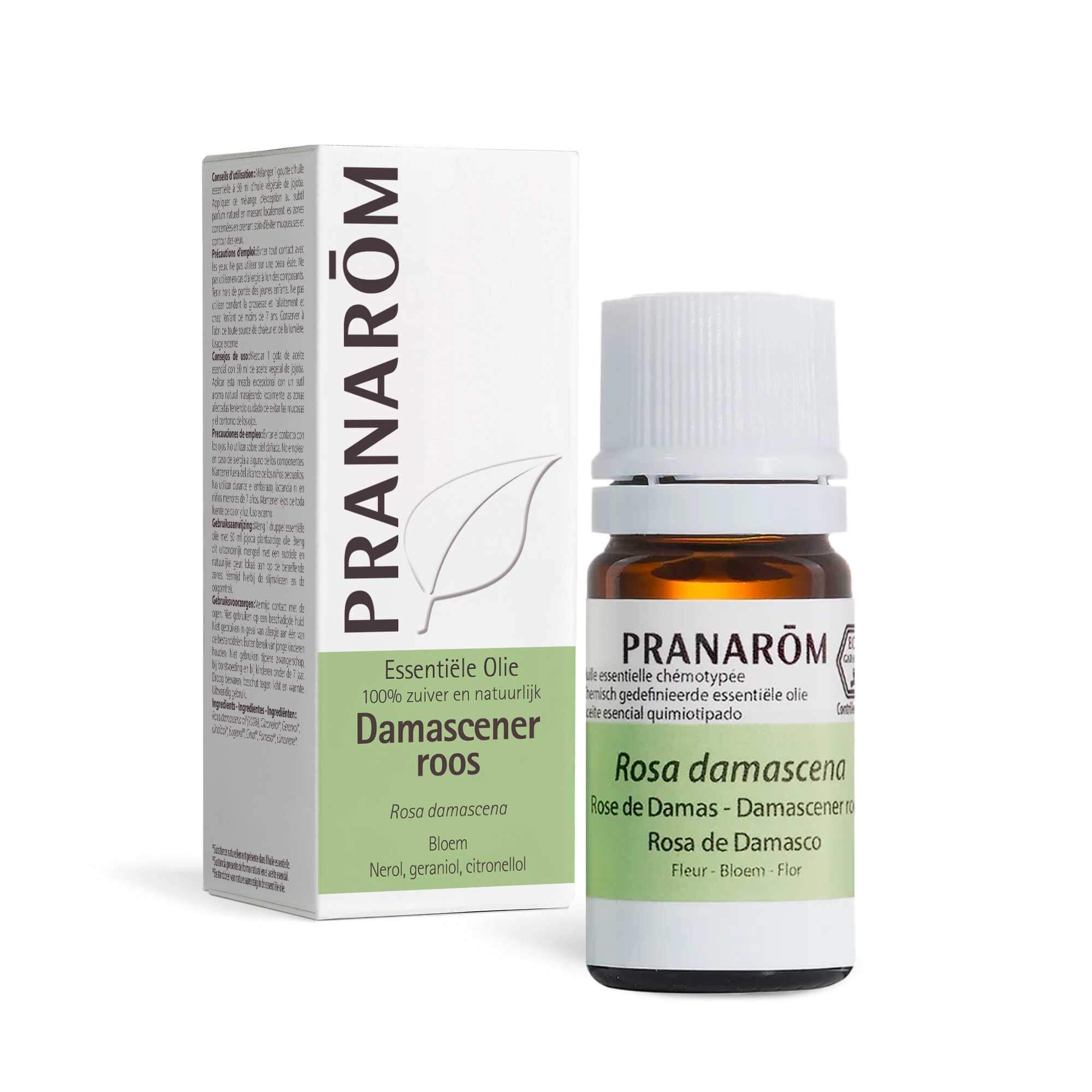 Productfles en verpakking. Fles met witte dop. Verpakking met merk PRANAROM en productnaam.