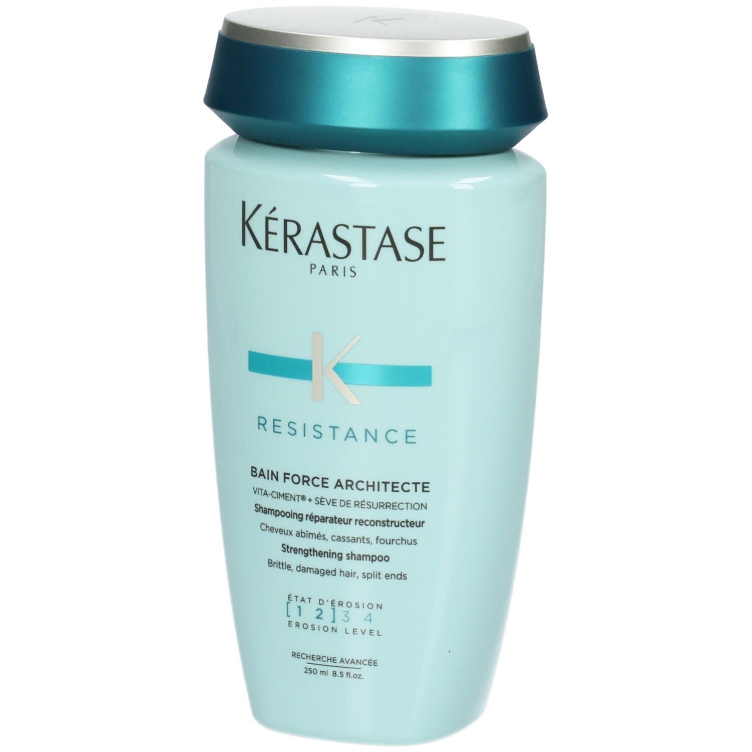 Lichtblauwe Kérastase fles met turkooizen dop. Versterkende shampoo voor beschadigd haar.