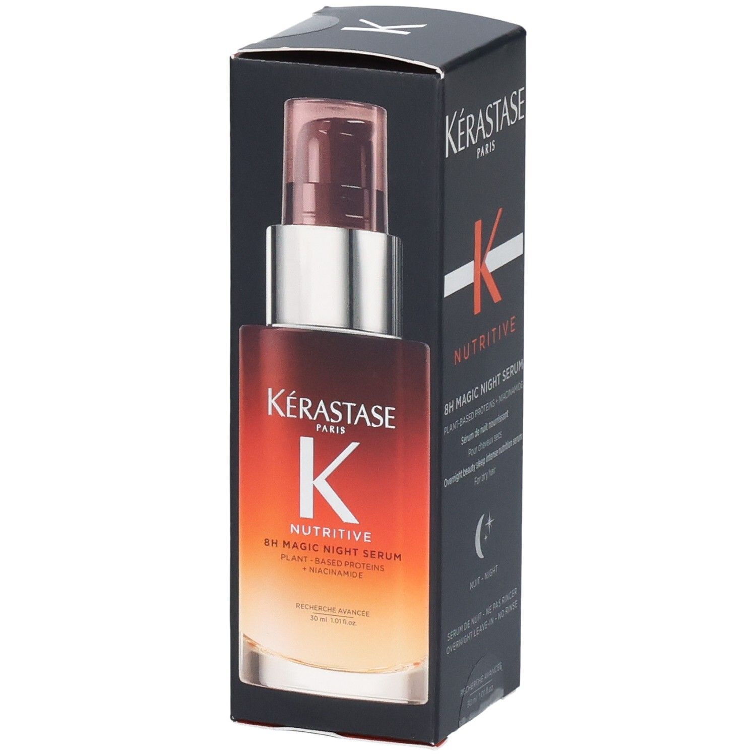 Kérastase Nutritive 8h Magic Night Serum Flacon avec pompe, partiellement dans sa boîte ouverte.