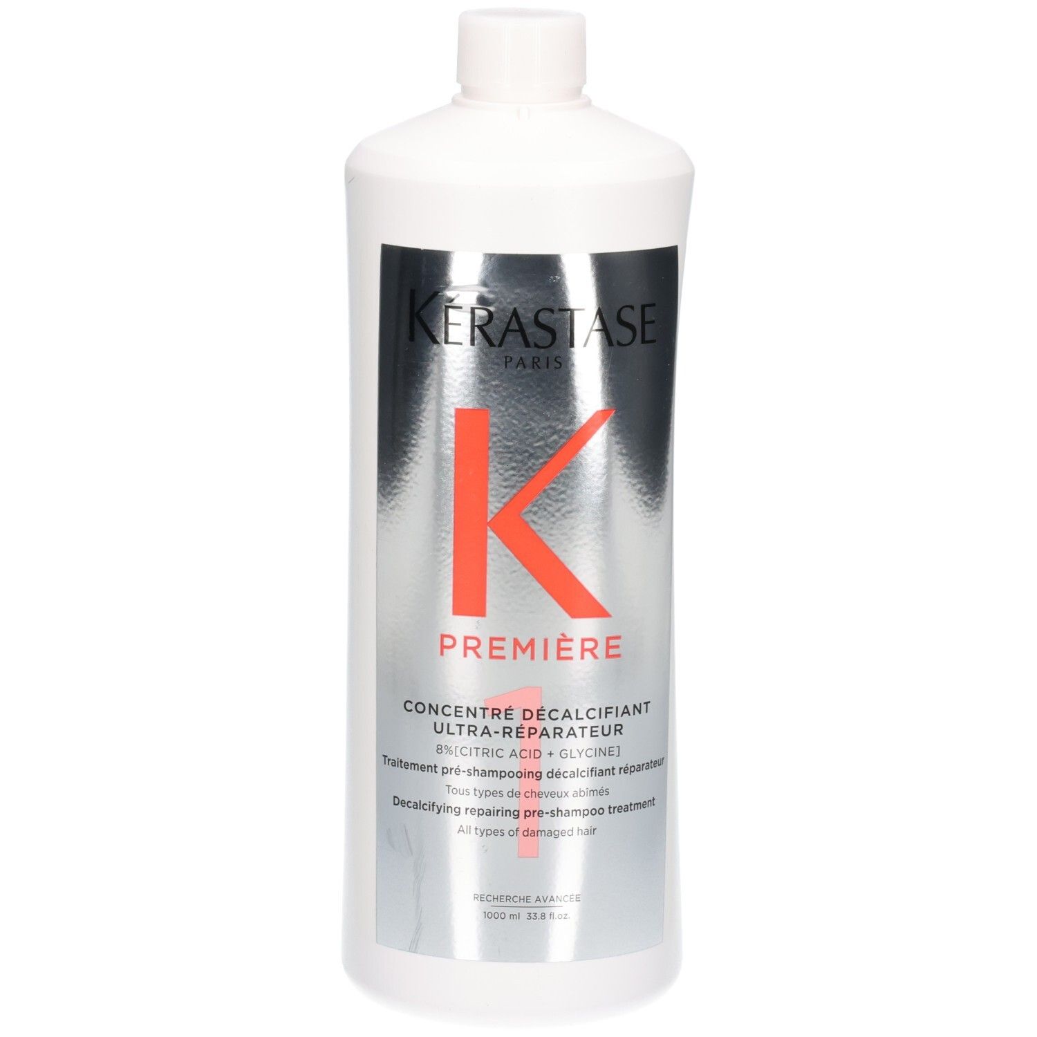 Witte fles met Kérastase Première Concentré Décalcifiant Ultra-Réparateur etiket.