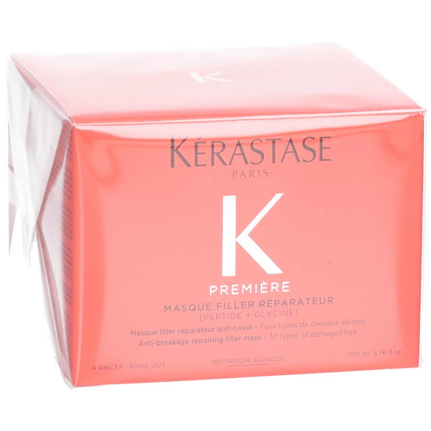 Kérastase Première Masque Filler Réparateur haarmasker in rode verpakking, licht schuin.