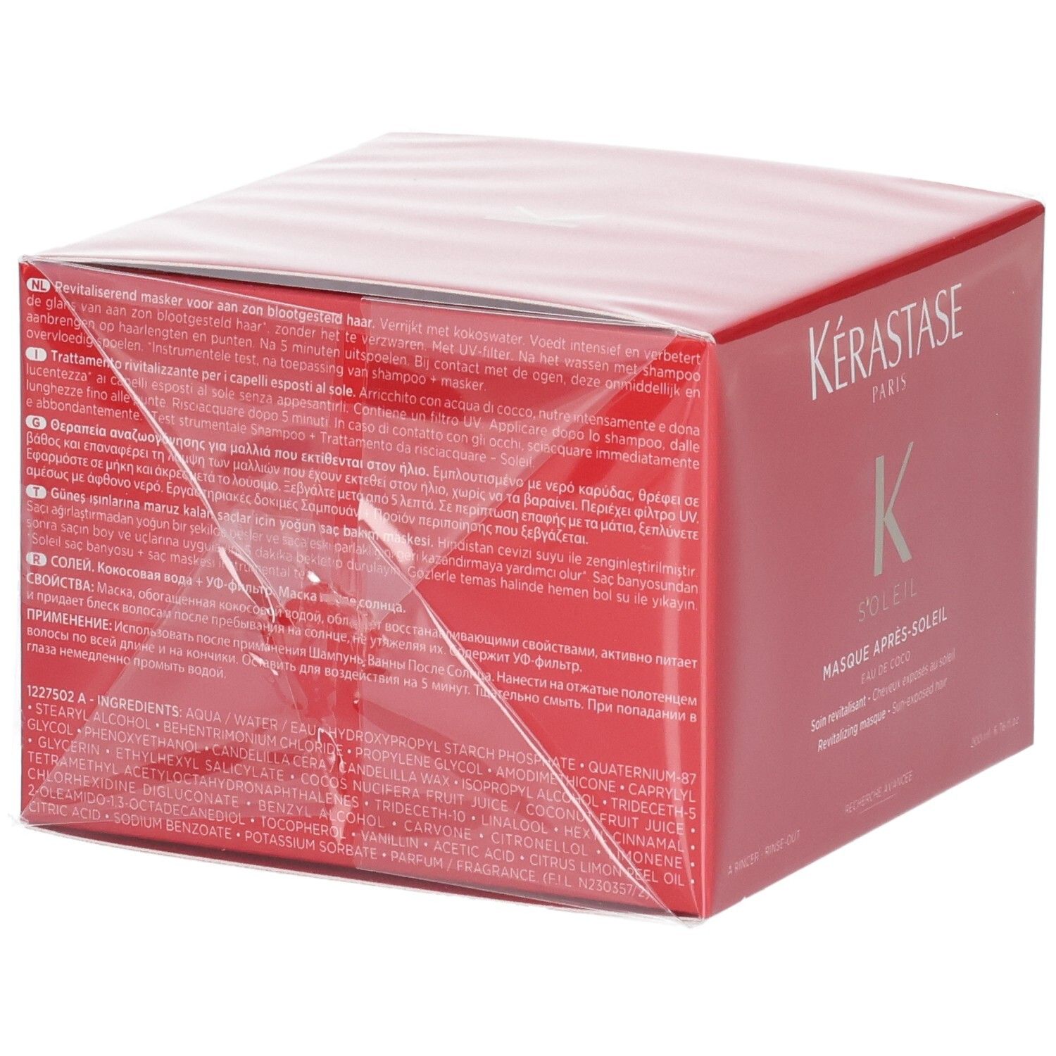 Emballage rouge Kérastase Soleil Après-Soleil avec instructions d'utilisation détaillées et ingrédients en plusieurs langues.