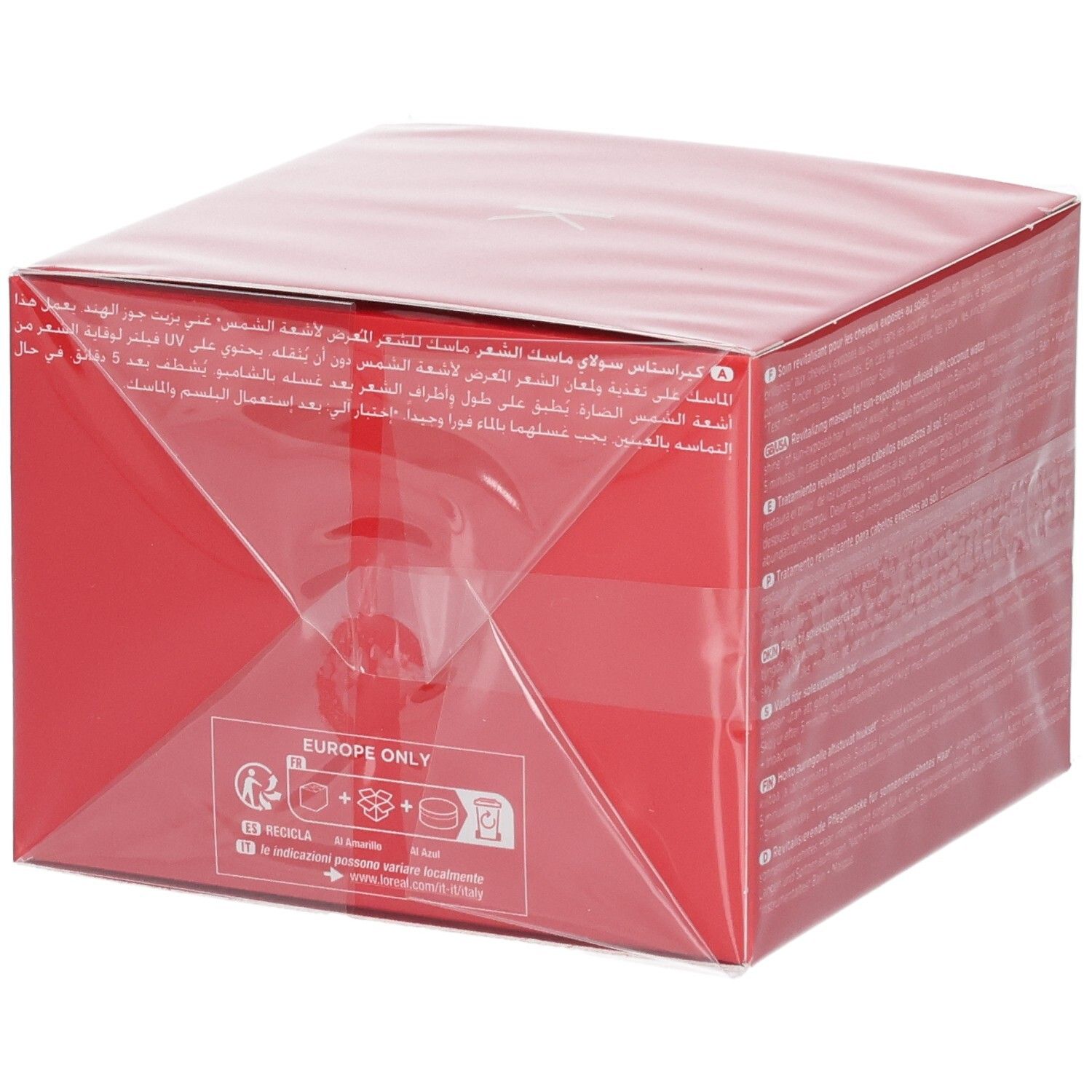 Arrière de l'emballage rouge Kérastase Soleil Après-Soleil avec symboles d'application et de recyclage.