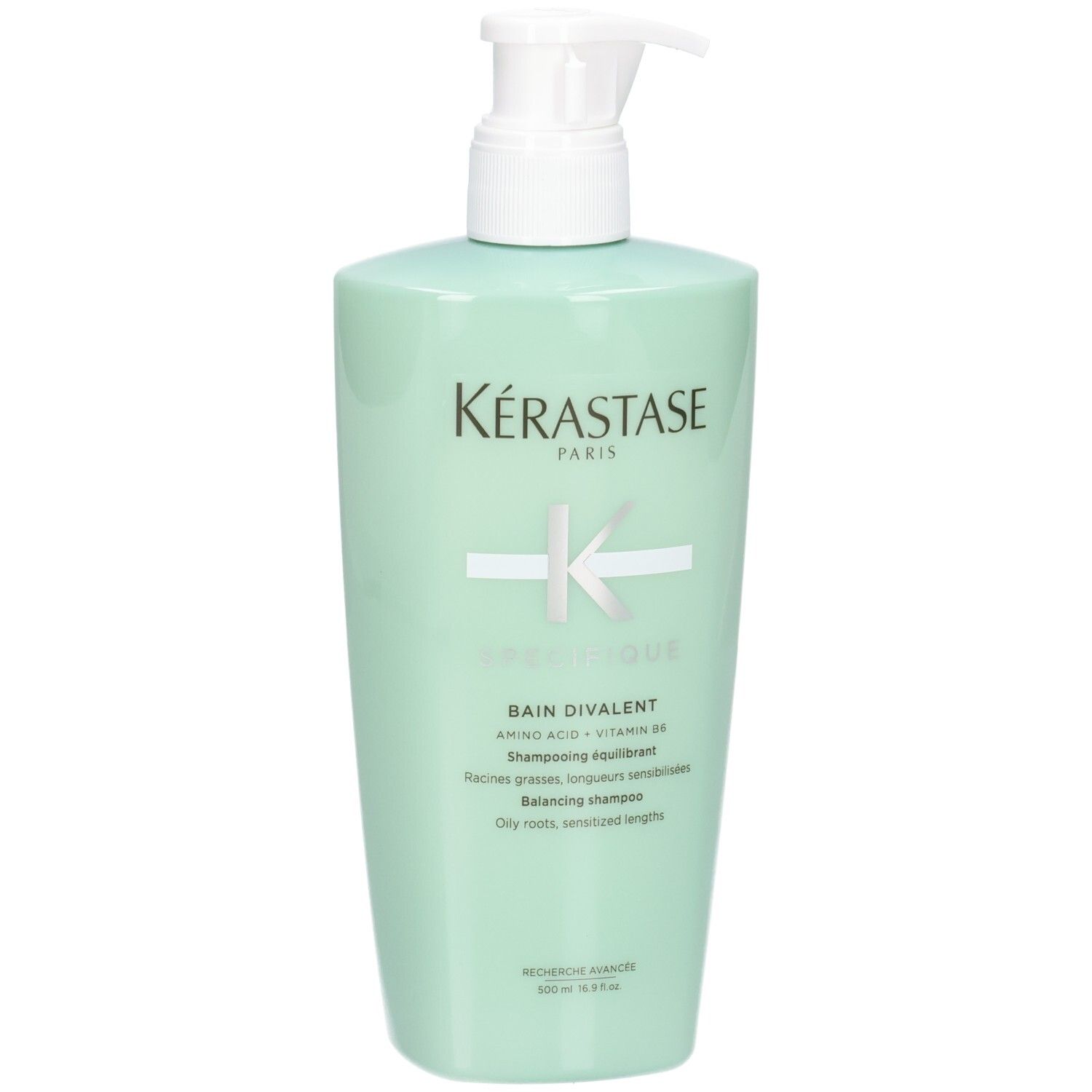 Kérastase Spécifique Bain Divalent Shampooing équilibrant dans une bouteille vert menthe avec pompe.