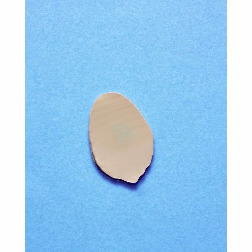 Zijkant van een NIVEA BB Cream doosje met applicatie-instructies en ingrediënten.