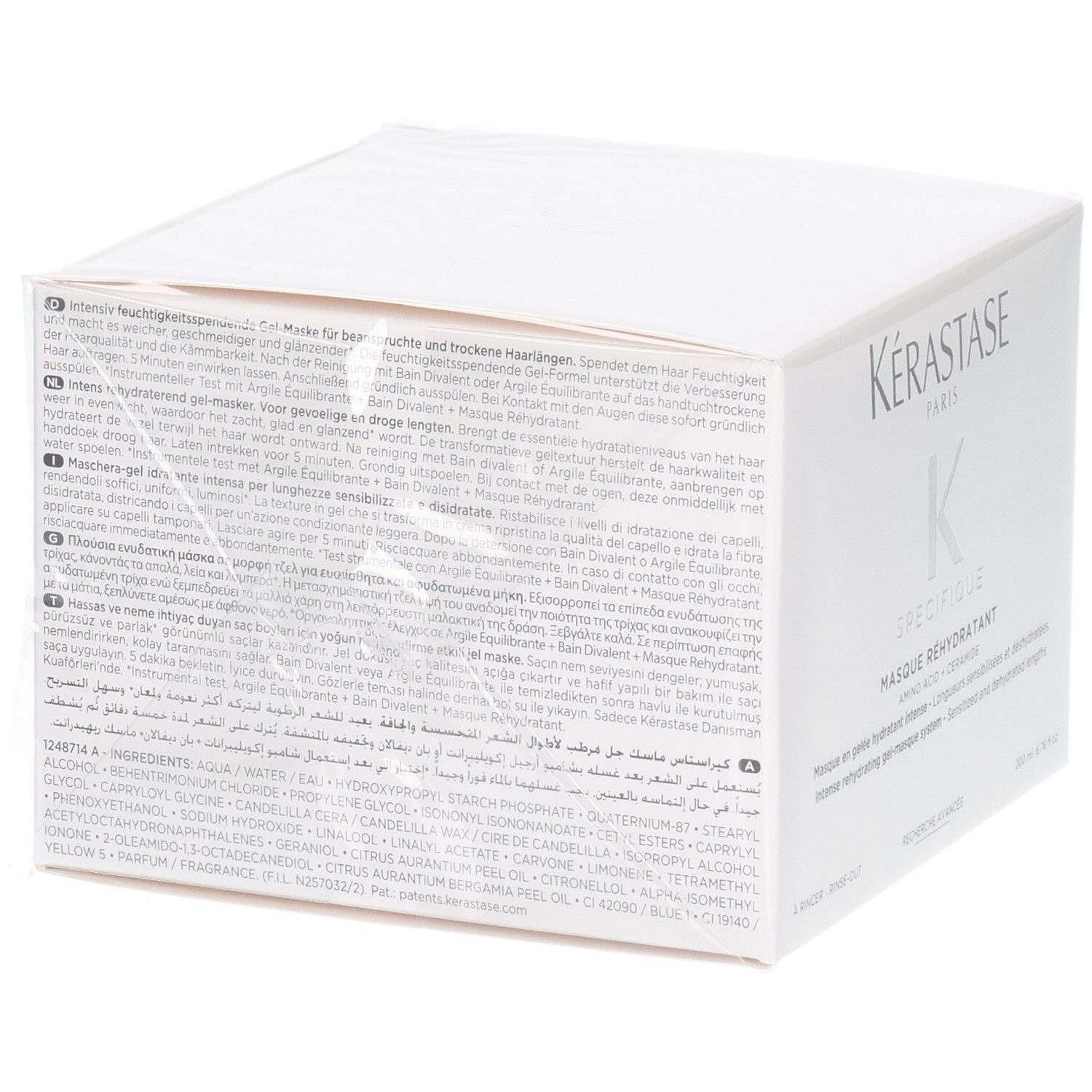 Achterkant van de Kérastase Masque Réhydratant verpakking met gedetailleerde instructies en ingrediënten.