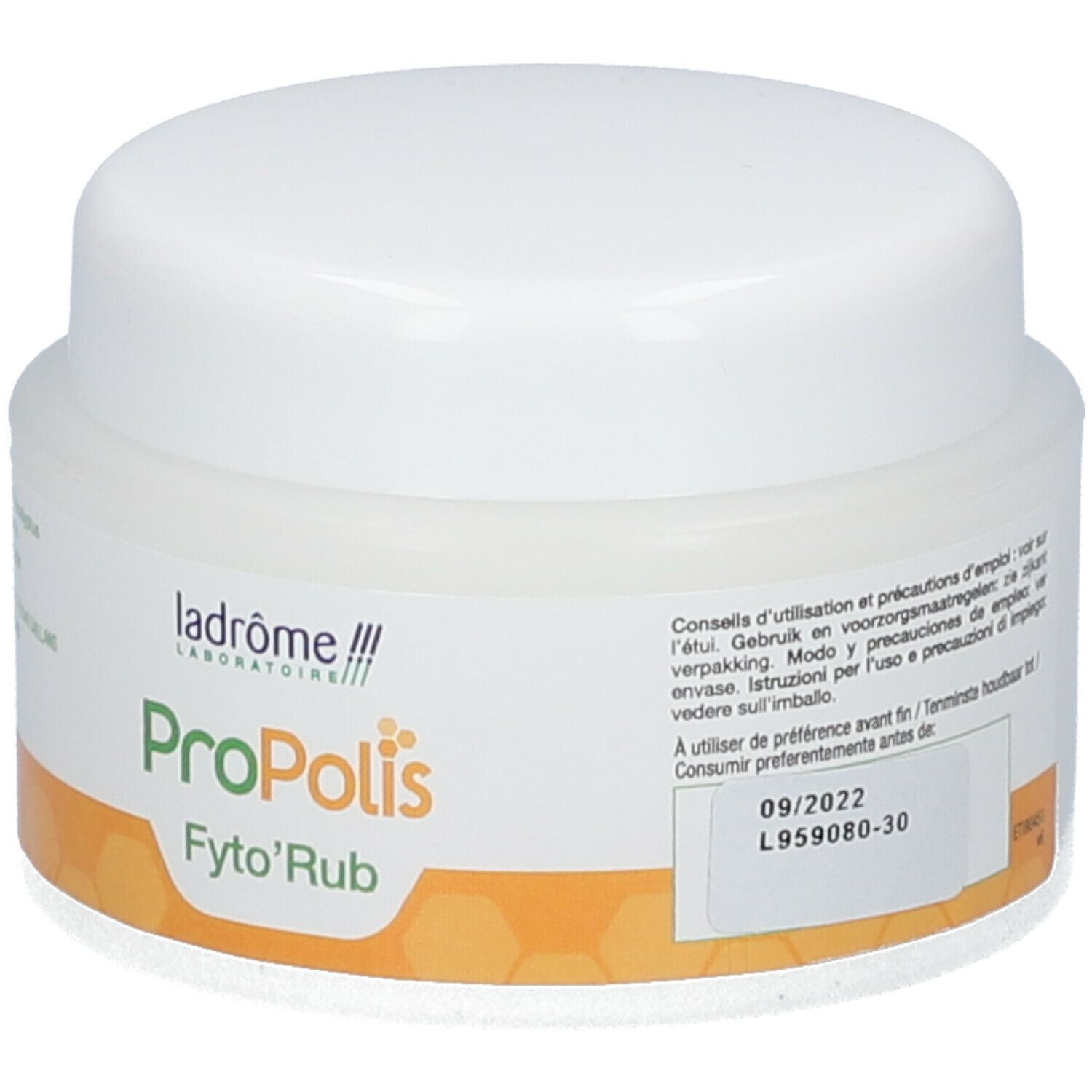 Pot blanc avec couvercle. Étiquette avec nom du produit : Propolis Fyto'Rub. Marque : Ladrôme.