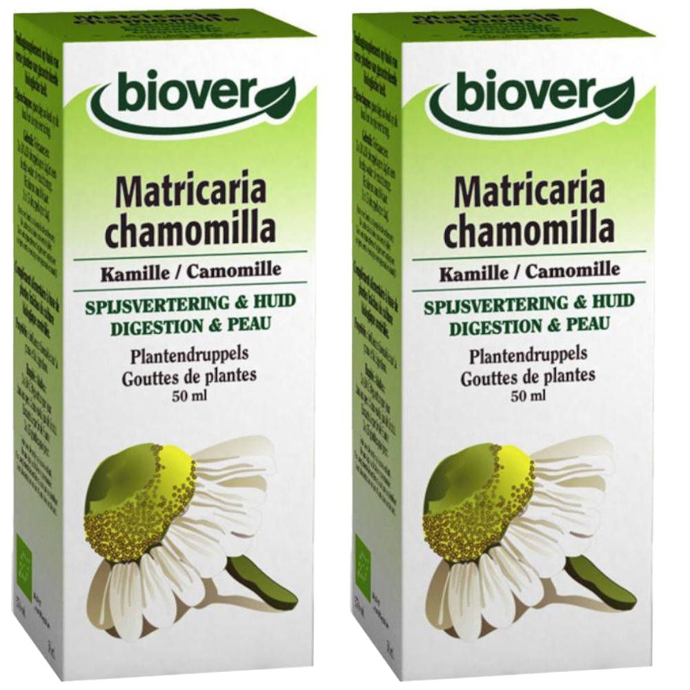 Twee dozen met "biover" logo en "Matricaria chamomilla". Tekst in het Duits, Frans en Nederlands. Illustratie van kamillebloem.