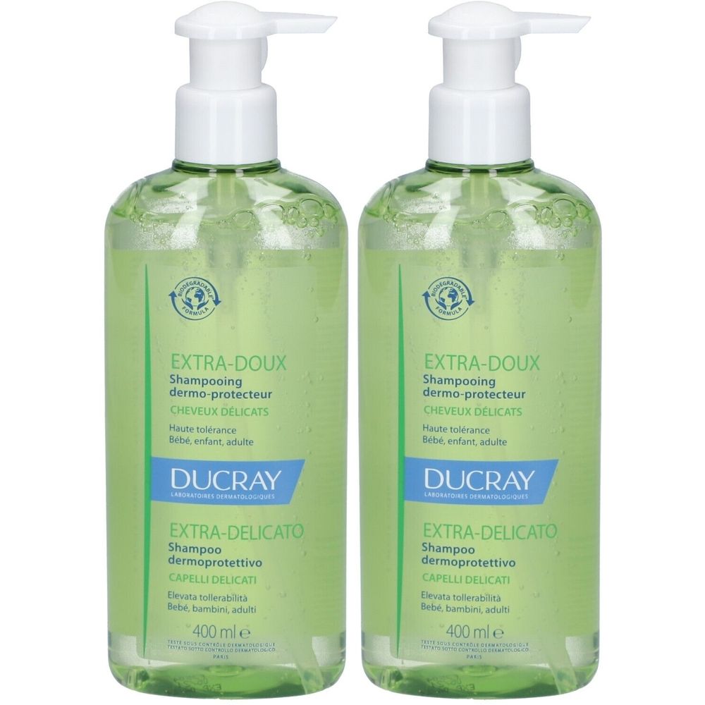 Deux flacons de shampooing DUCRAY verts avec pompe. Inscription: EXTRA-DOUX, Shampooing dermo-protecteur, 400 ml.