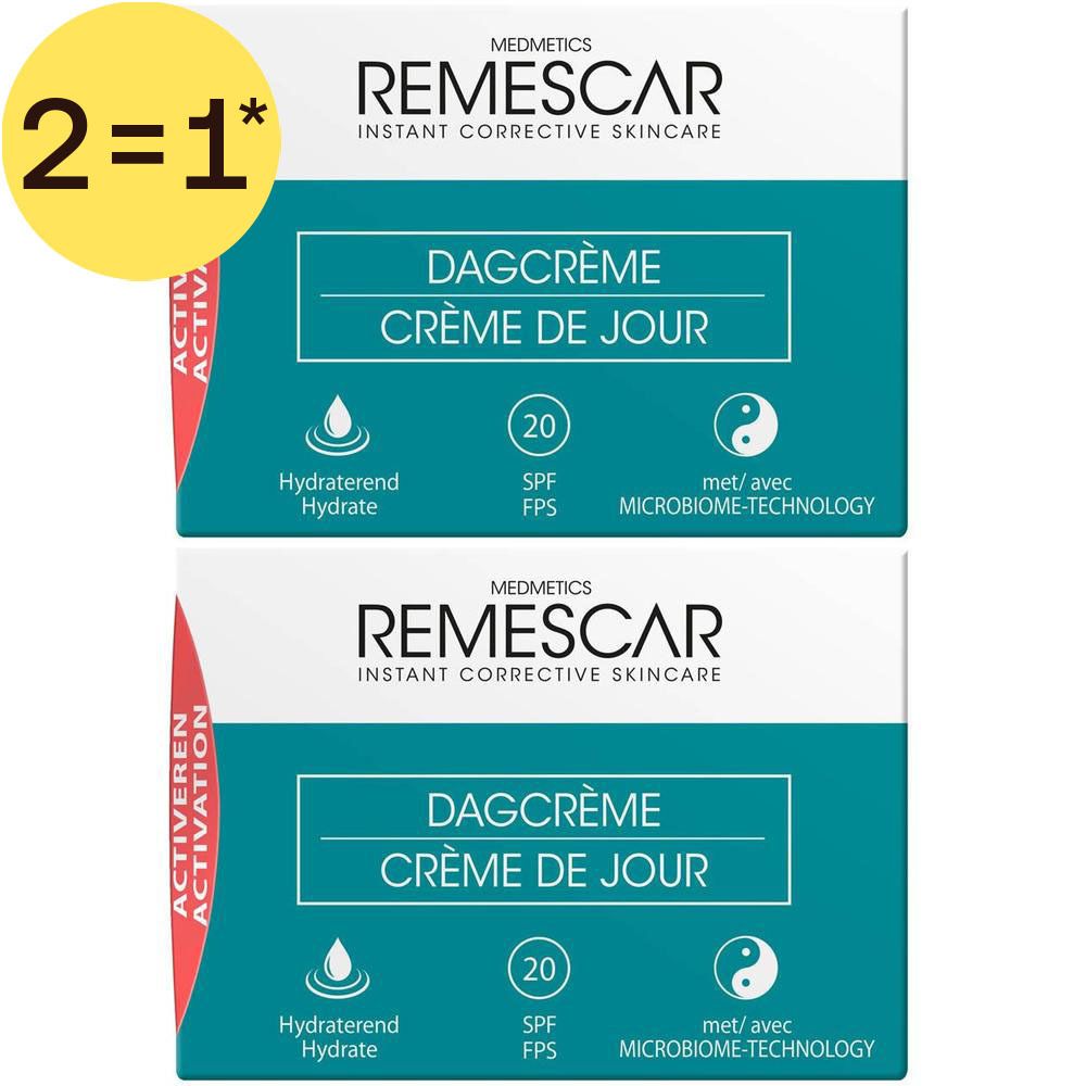 Twee verpakkingen Remescar Dagcrème SPF 20. Gele 2=1* markering. Tekst in het Nederlands en Frans.