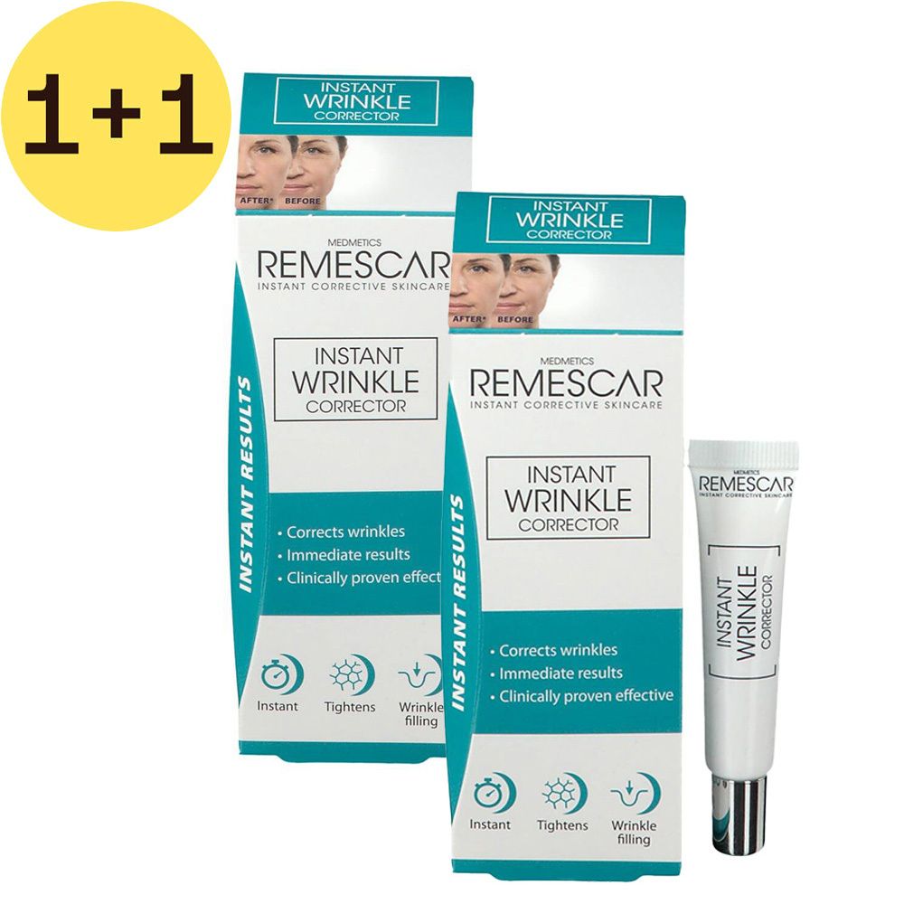 Twee dozen en een tube. Op de dozen staat "Instant Wrinkle Corrector" en "Remescar". Op de tube staat "Instant Wrinkle Corrector".