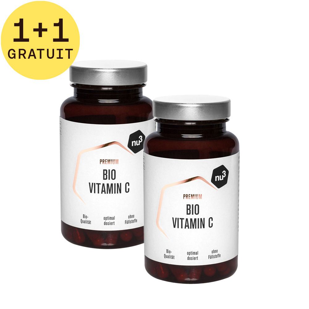 Deux flacons avec étiquettes. Inscription: BIO Vitamin C. Cercle jaune avec "1+1 GRATUIT".