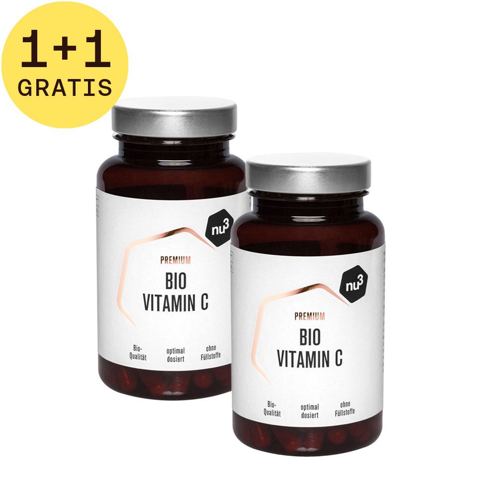 Twee flessen met etiketten. Opschrift: BIO Vitamin C. Gele cirkel met "1+1 GRATIS". 