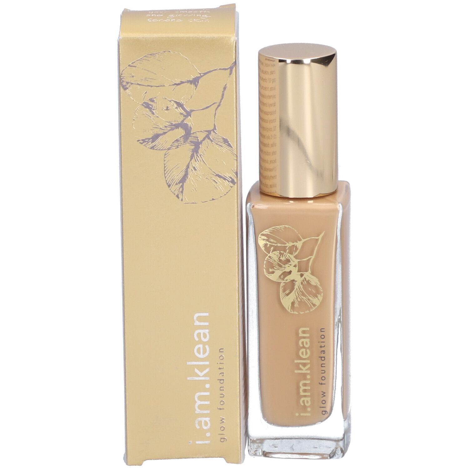 Fond de teint liquide en flacon de verre avec bouchon argenté. Inscription : i.am.klean glow foundation.