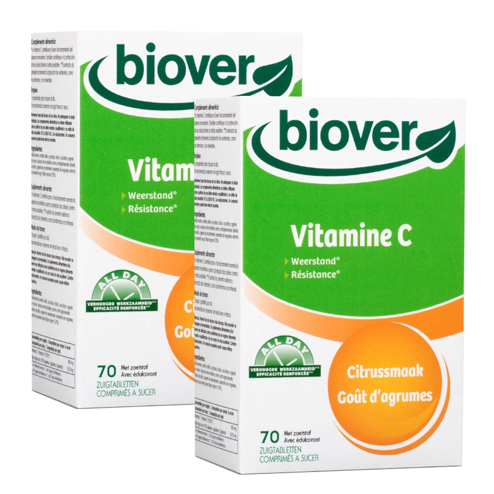 Deux boîtes de Biover Vitamine C à sucer. Emballage vert et blanc avec nom et logo du produit. 70 comprimés par boîte.