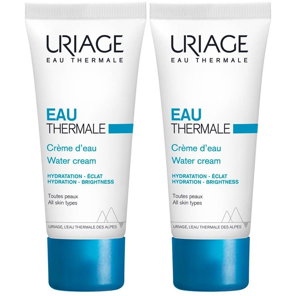 Deux tubes de crème. Blanc, avec texte et accents bleus. Inscription : URIAGE EAU THERMALE, Crème d'eau, Water cream.