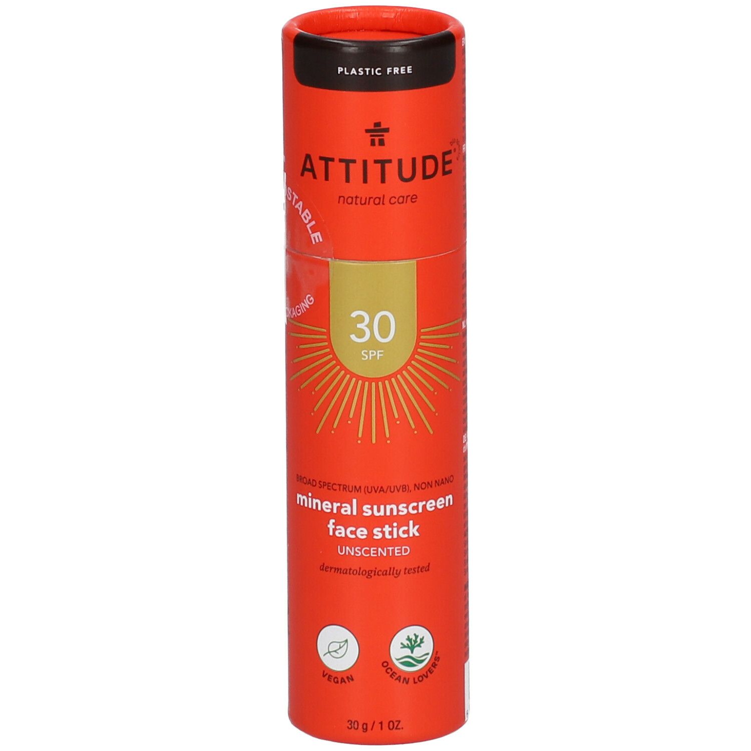 Oranje cilindrische verpakking met productinformatie. "ATTITUDE" logo, "SPF 30" en "mineral sunscreen face stick" zichtbaar.