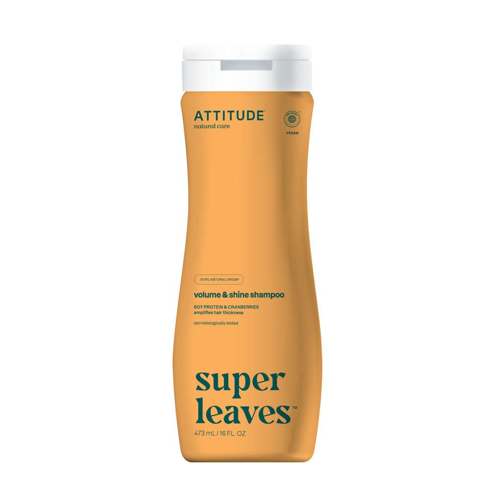 Shampoing Attitude Super Leaves Volume & Brillance, bouteille beige avec bouchon blanc et motif feuilles.