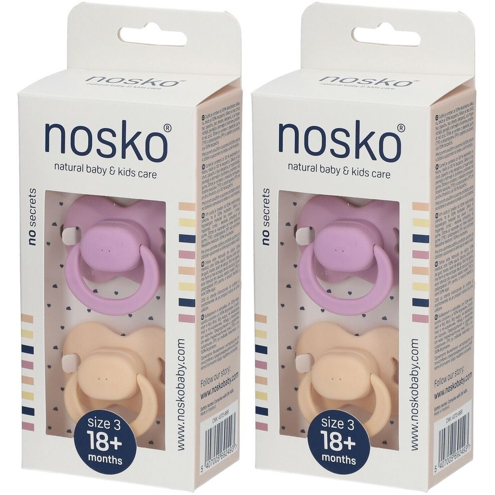 Twee fopspenen in verpakking. Merk nosko. Verpakking met twee fopspenen, paars en beige. Maat 3, 18 maanden en ouder.