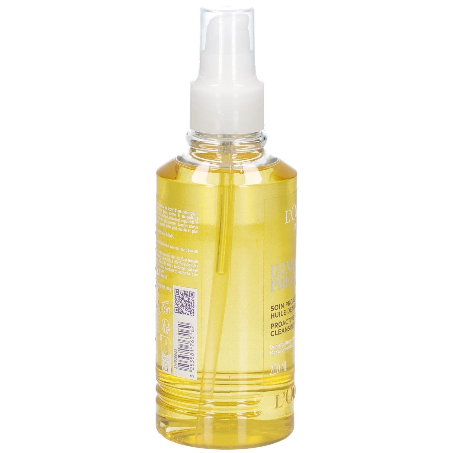 Achterkant van de L'OCCITANE Immortelle reinigingsolie in een heldere spuitfles met gele olie.