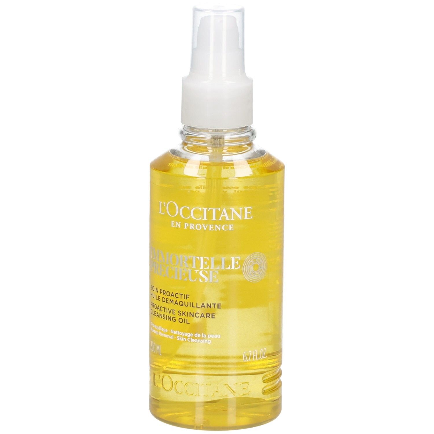 L'OCCITANE Immortelle reinigingsolie in een heldere spuitfles met gele olie.