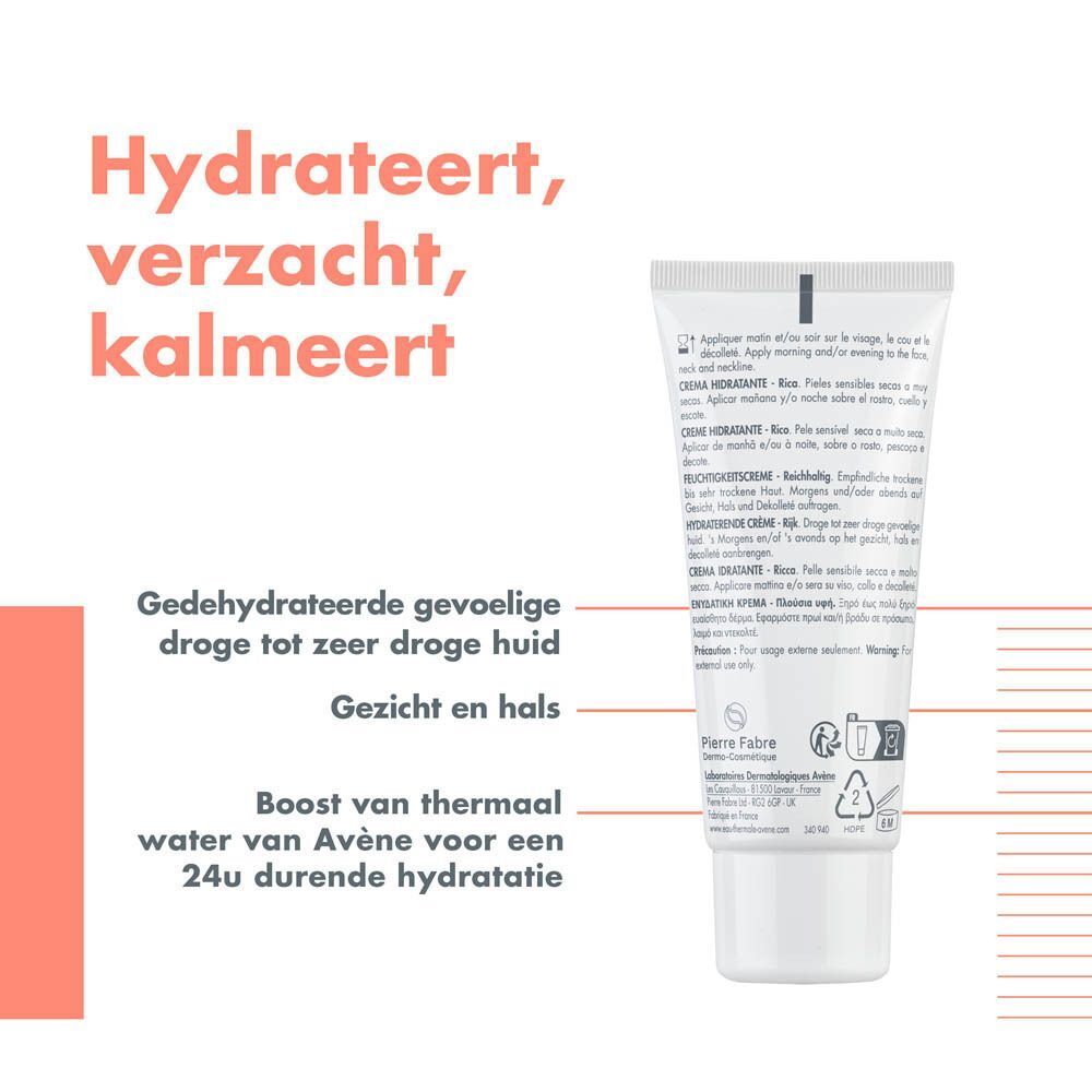 Close-up van een witte crème. Tekst: Textuur fluide et fondante, Parfum doux et léger.