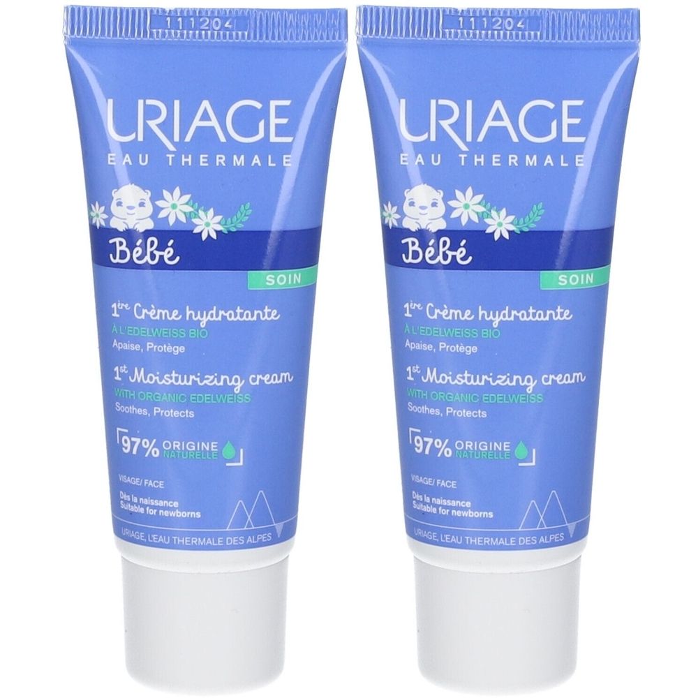 Deux tubes bleus avec texte. Inscription: URIAGE Bébé, 1. Crème hydratante, 1. Moisturizing cream. 97% origine naturelle.