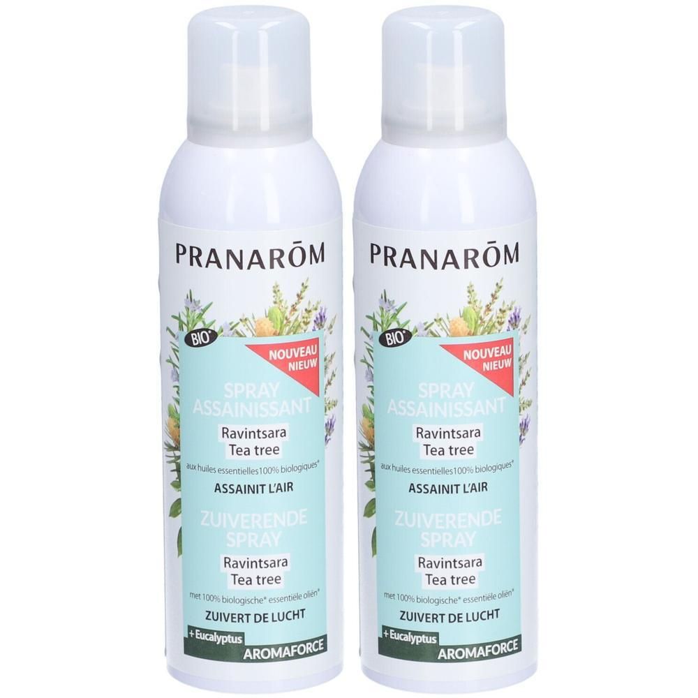 Twee witte sprayflessen met PRANAROM. Labels met productnaam, bloemenillustraties en BIO-certificering. Nieuw.