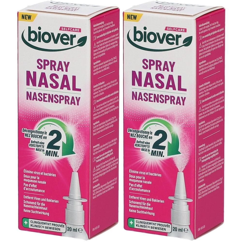 Deux boîtes de spray nasal. Flacon blanc, emballage rose. Texte : Spray Nasal, Biover, 20 ml.