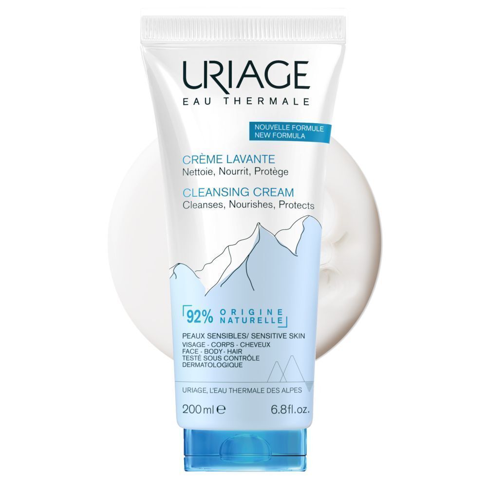 Deux tubes de Crème Lavante Uriage avec autocollant 1+1 GRATUIT. Tubes blancs avec bouchon bleu. Texte: Crème Lavante, Uriage Eau Thermale.