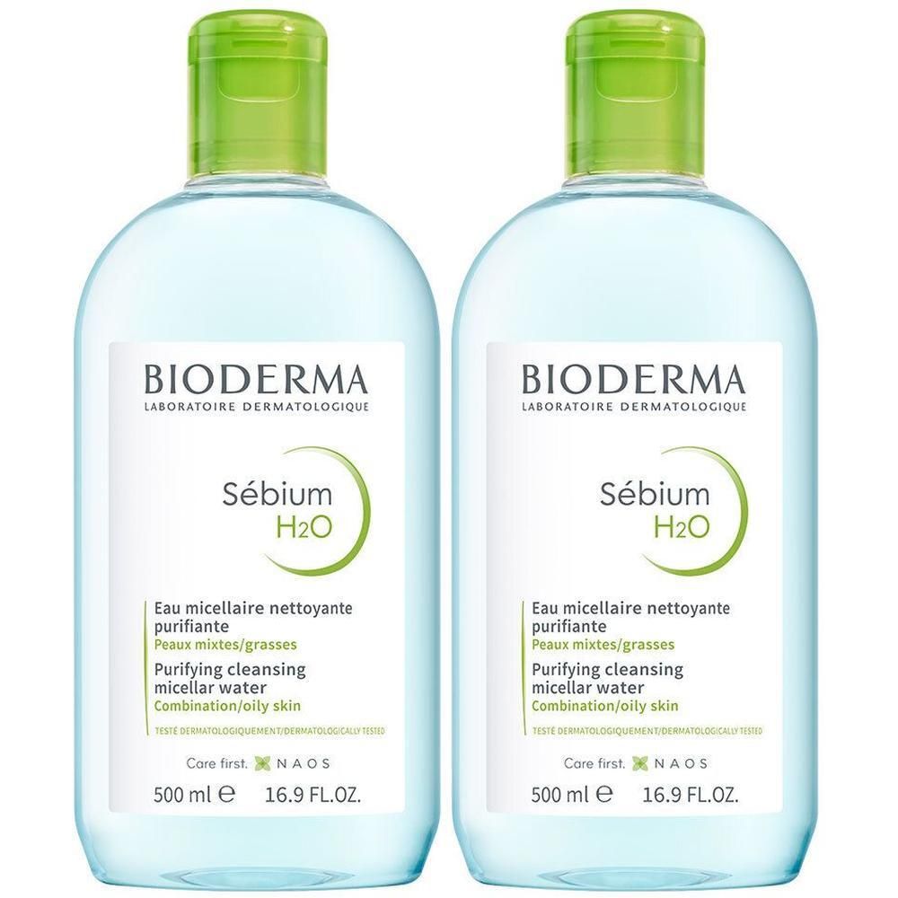 Twee flessen met groene dop. Opschrift: BIODERMA Sébium H2O, Eau micellaire nettoyante purifiante. 500 ml.