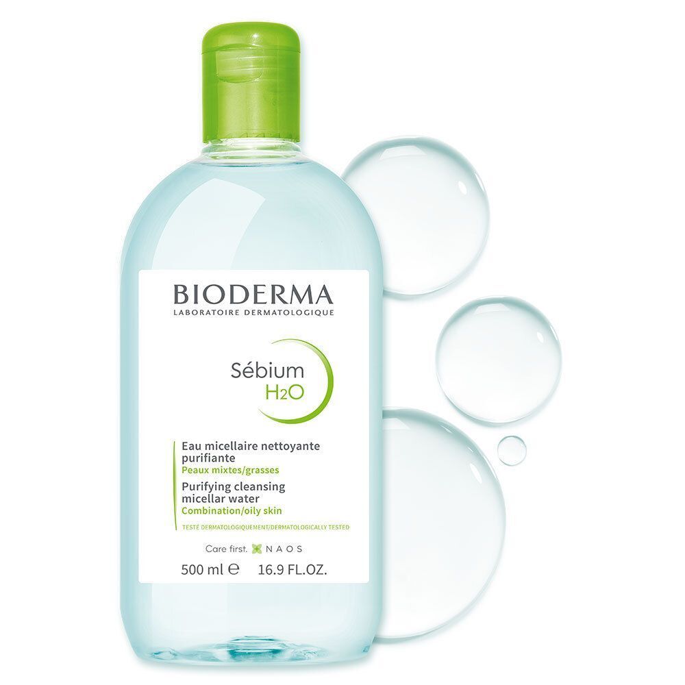 Fles met groene dop en drie waterdruppels. Opschrift: BIODERMA Sébium H2O, Eau micellaire nettoyante purifiante. 500 ml.