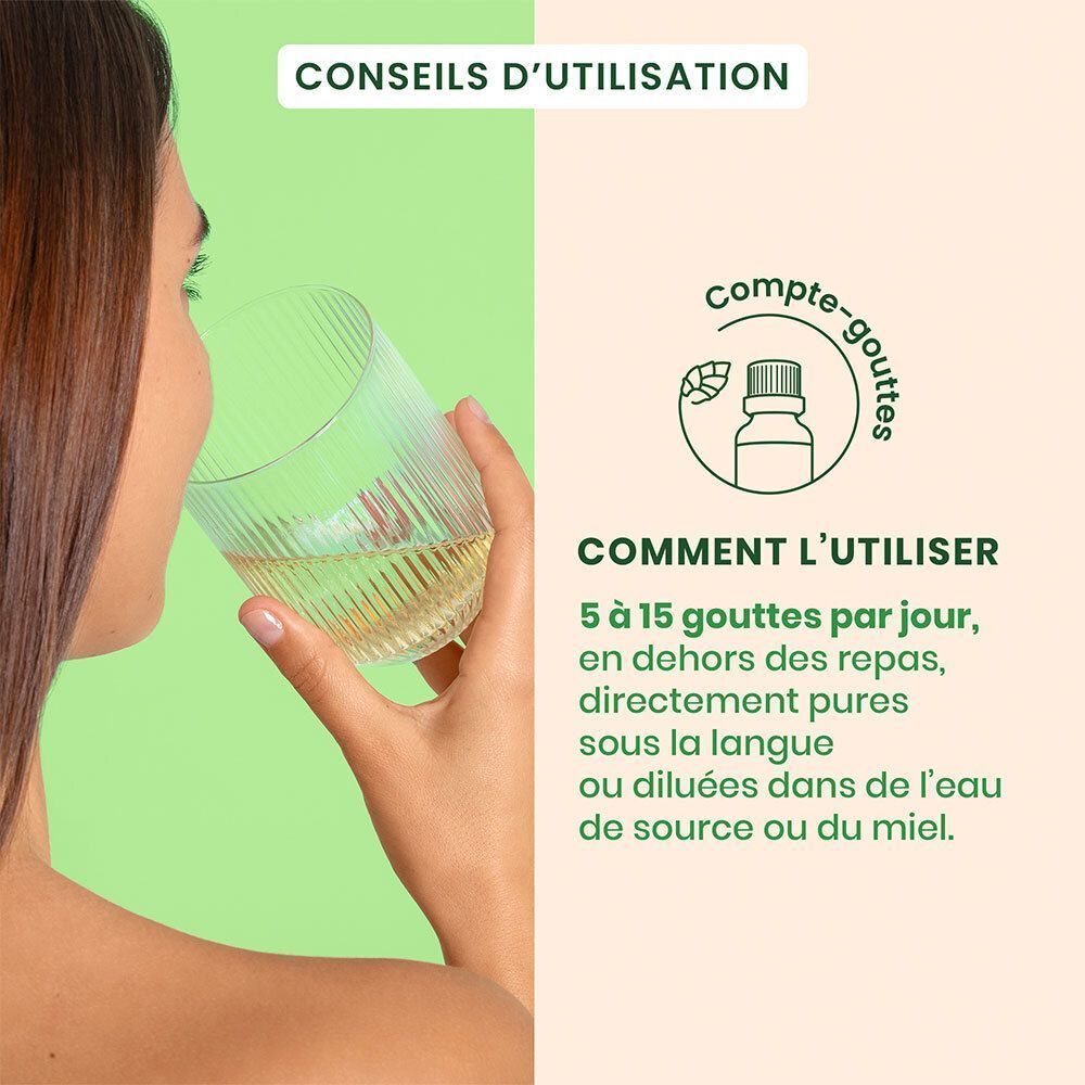 Femme buvant un verre, à côté les instructions d'utilisation des gouttes HerbalGem Figuier Bio.