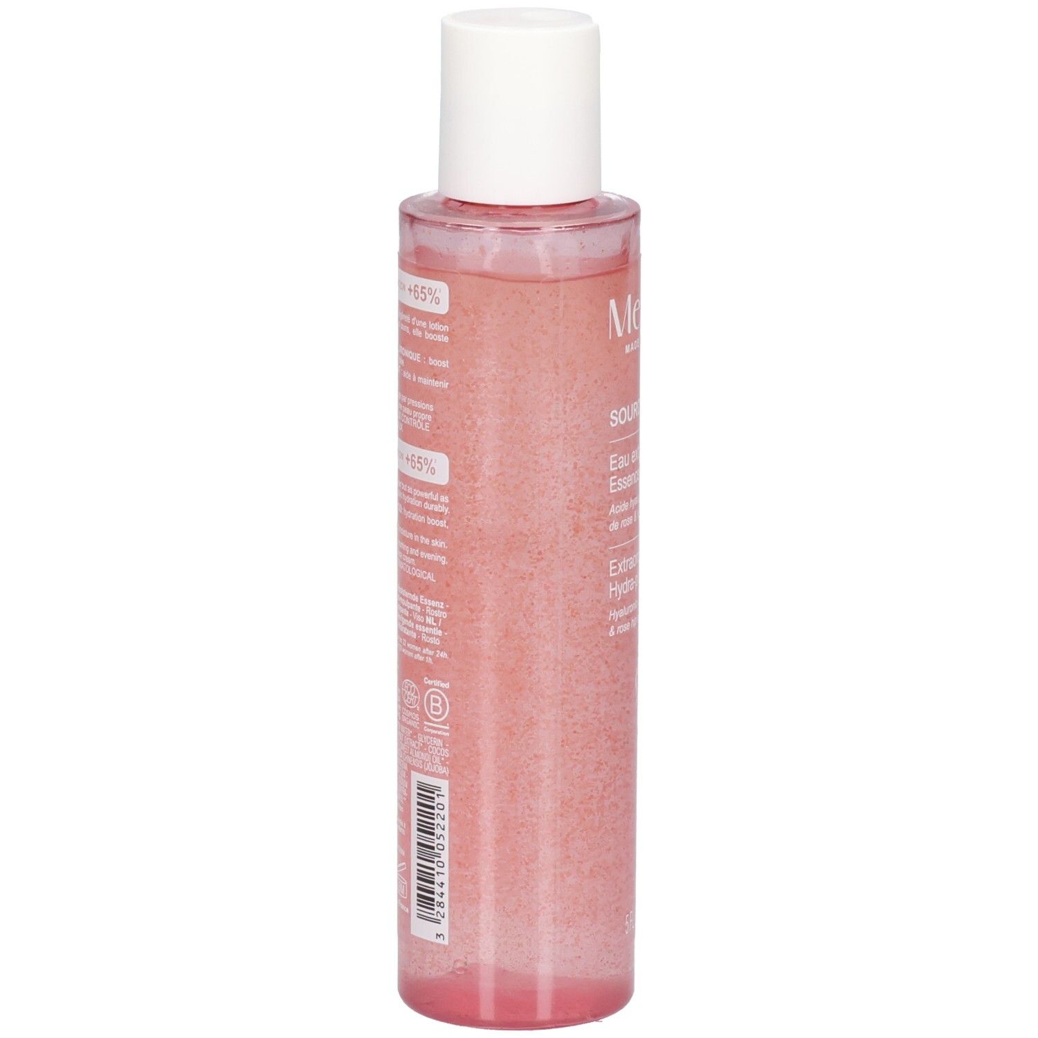 Vue arrière du flacon d'essence de rose. Informations textuelles sur l'étiquette. Flacon transparent avec liquide rose et bouchon blanc.