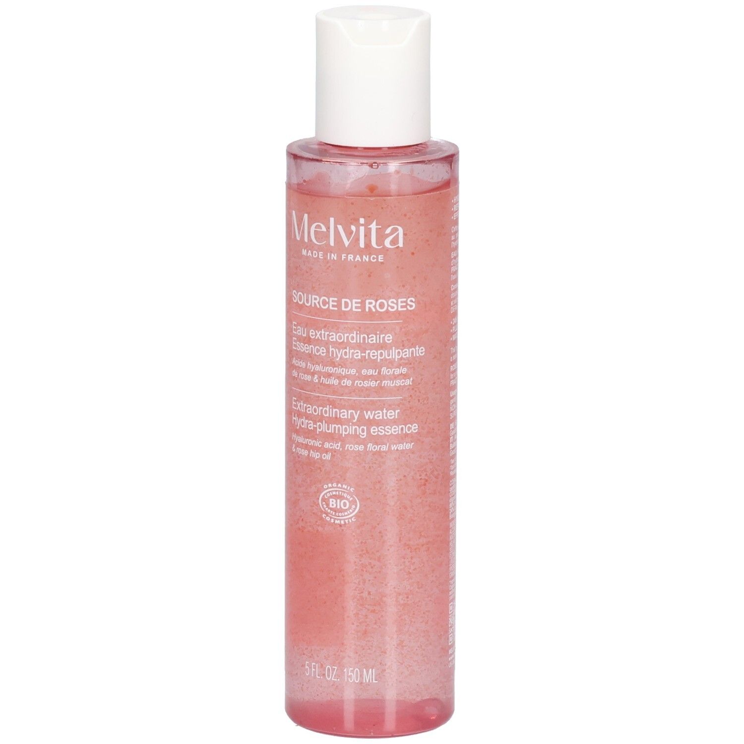 Flacon d'essence de rose. Logo Melvita et nom du produit. Flacon transparent avec liquide rose et bouchon blanc. Certification bio.