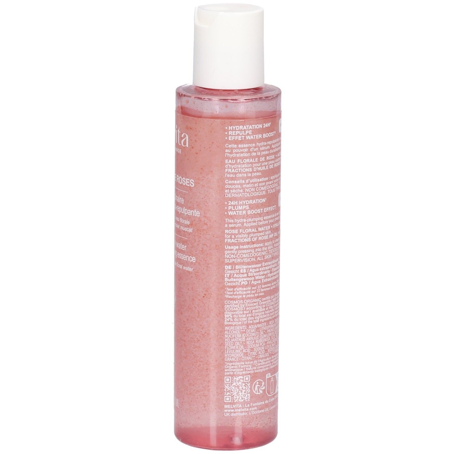 Vue arrière du flacon d'essence de rose. Informations textuelles sur l'étiquette. Flacon transparent avec liquide rose et bouchon blanc.