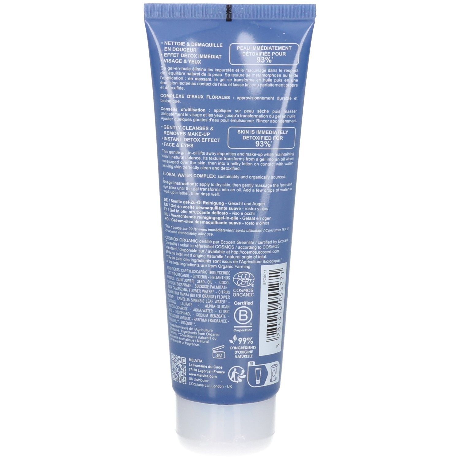 Dos du tube bleu. Texte multilingue. Inscription: Nettoie & démaquille, effet détox, 99% ingrédients d'origine naturelle.
