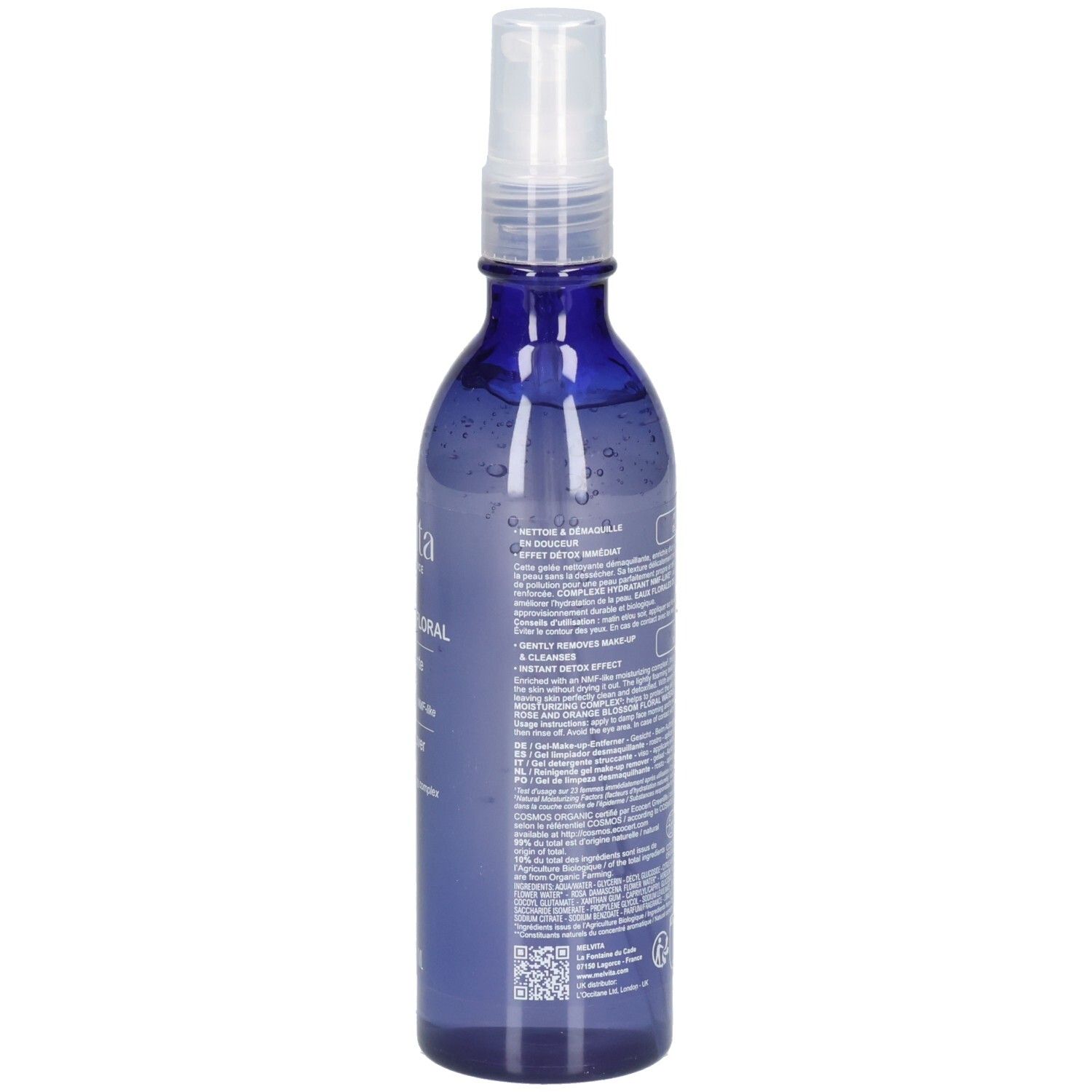 Achterkant Melvita make-up remover, blauwe spuitfles met tekst.