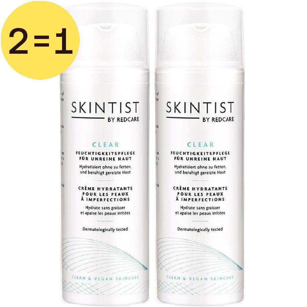 Twee Skintist Clear Crème Hydratante flessen. Opschrift: 2=1. Hydraterende crème voor de onzuivere huid. Dermatologisch getest.