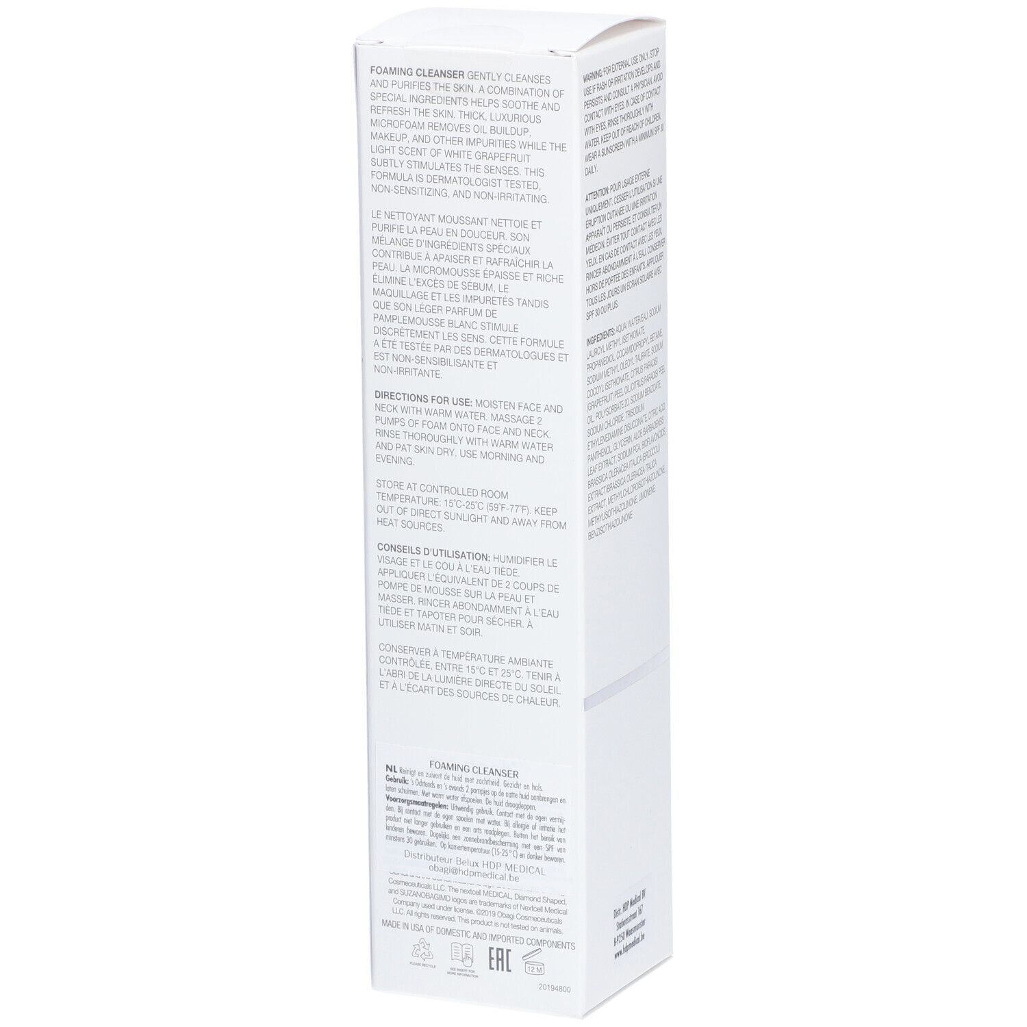 Emballage blanc avec texte. Contient des informations d'utilisation et de stockage. Marque non visible.