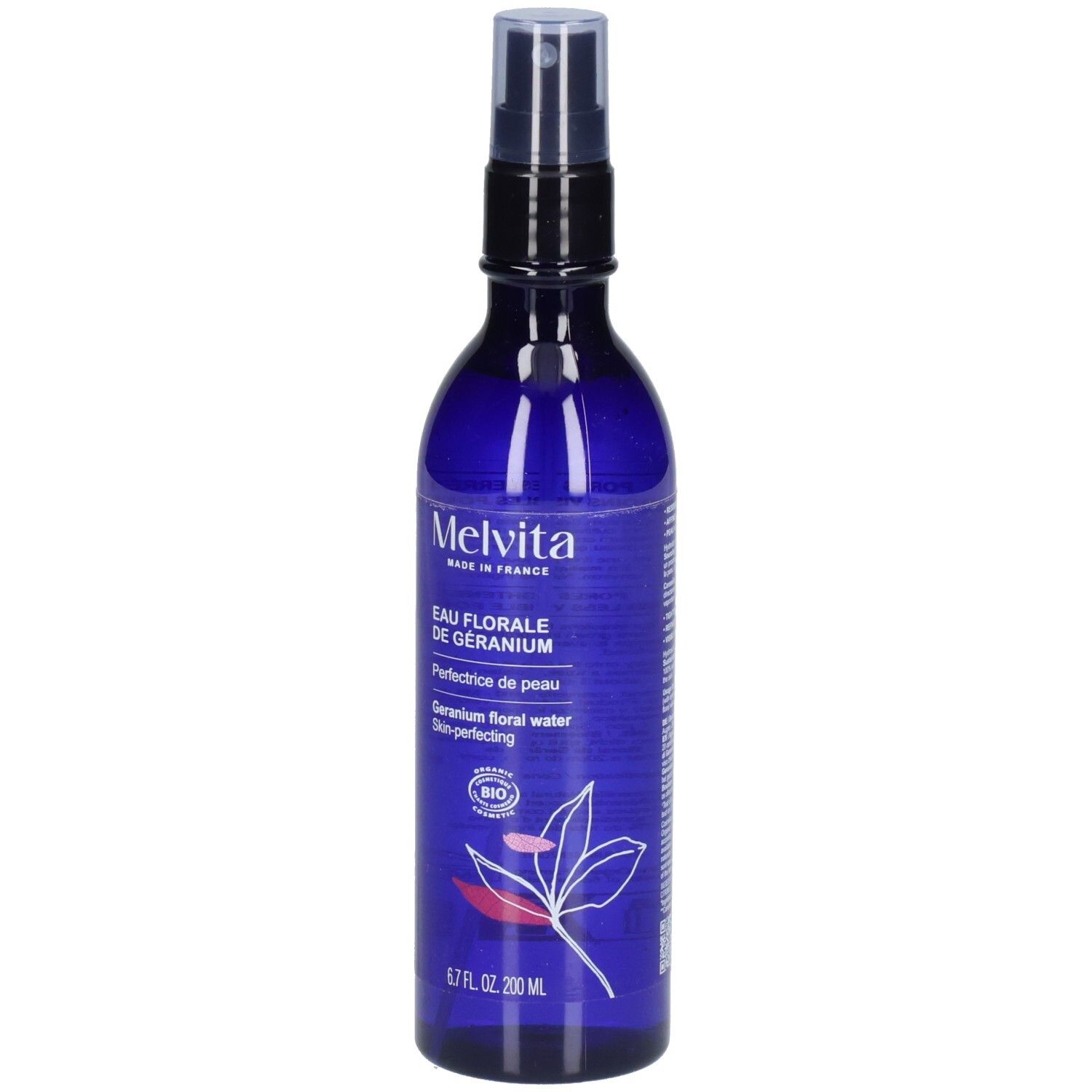 Blauwe fles met verstuiver. Opschrift: Melvita, Eau Florale de Géranium, 6.7 FL. OZ. 200 ml. Bio-certificering.