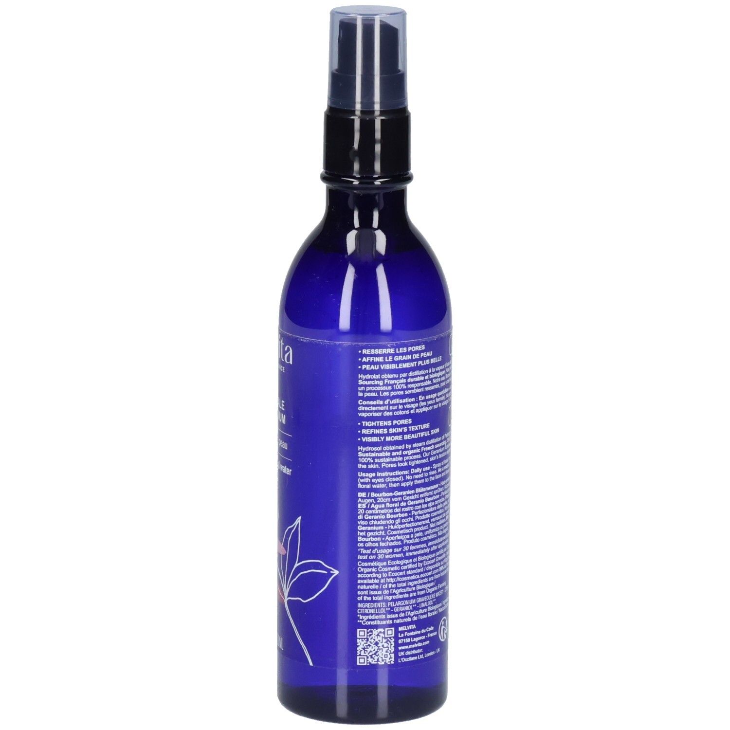 Blauwe fles met verstuiver. Tekst op de zijkant. Bio-certificering. Etiket met ingrediënten en instructies.