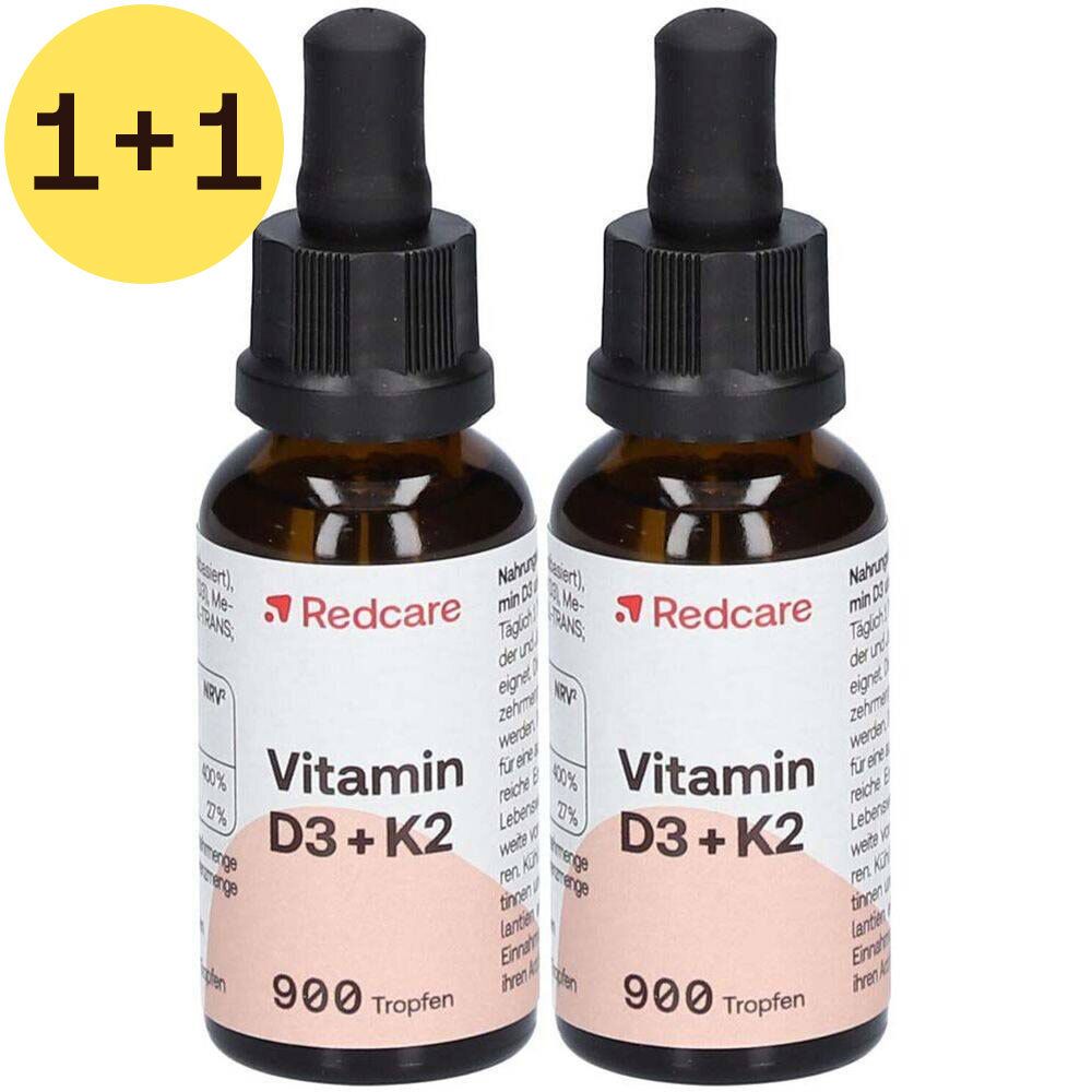 Deux flacons de gouttes de vitamine D3 + K2. Inscription: Redcare, 900 gouttes. Autocollant jaune: 1+1.