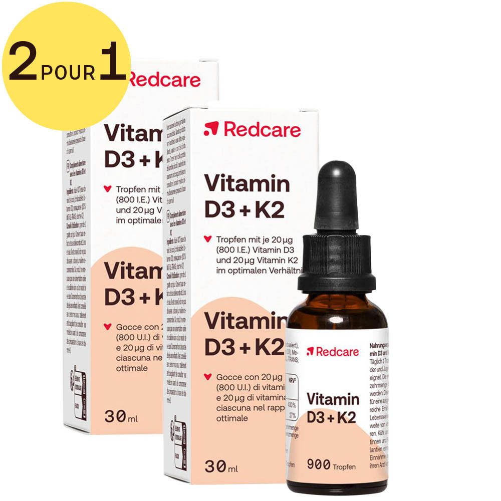 Un flacon et une boîte de vitamine D3 + K2. Inscription: Redcare, 900 gouttes. Autocollant jaune: 2 POUR 1.